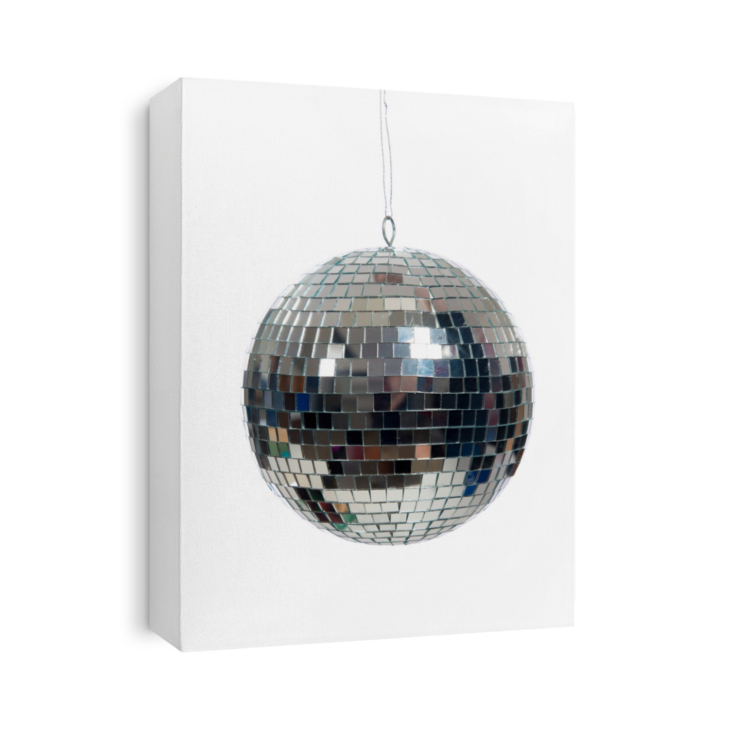 A silver mirrored disco ball on a white background